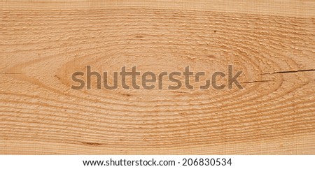 Wood background texture and a knot and a large crack on a plank of natural pine