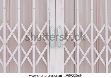 Pink metal grille sliding door with aluminum handle