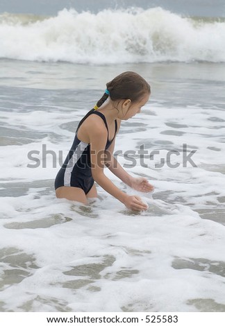 Girl playing with waves