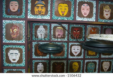 Saint faces on the ceiling of buddhist temple, Japan