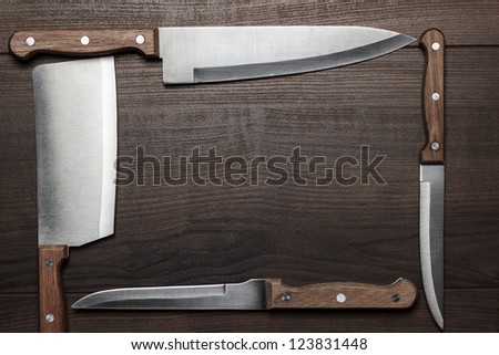 kitchen knifes on the brown wooden table