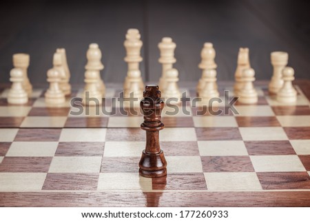 chess leadership conception on the wooden chessboard
