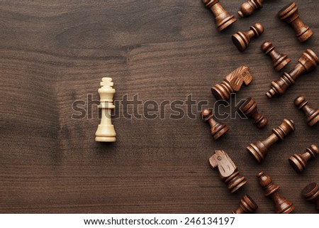 chess uniqueness concept on the wooden background