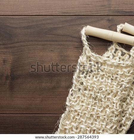 bound bast with wooden grips on the table background