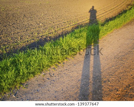 Picture of the shadow of the photographer at sunset