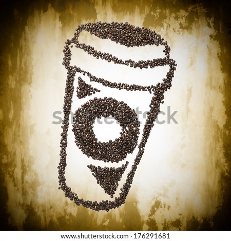 Image of a coffee to go cup made from coffee beans