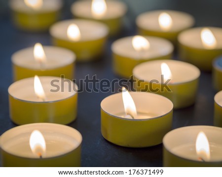 Image of burning tealight candles