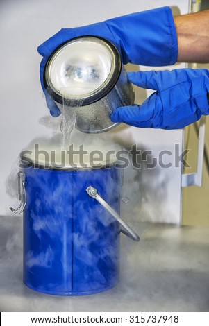 Person in a chemistry lab works with liquid nitrogen