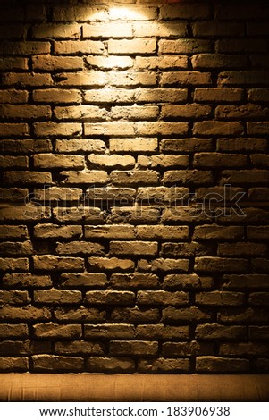 Old type brick wall texture front face with local lighting