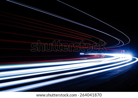 Light tralight trails in tunnel. Art image. Long exposure photo taken in a tunnel ils in tunnel.
