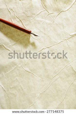 Old sheet of paper folded and battered, with paper texture.
