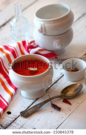 tomato soup on kitchen table. top shot