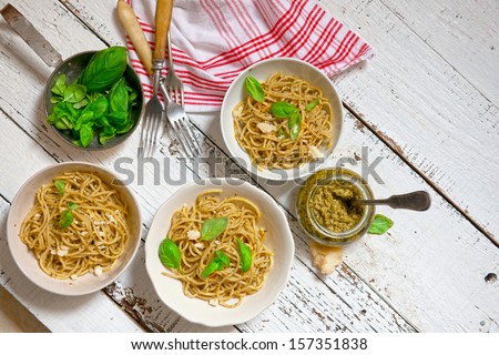 Pasta. Spaghetti Pasta with Pesto Sauce, Parmesan Cheese and Basil on a Fork. Italian. isolated backgrond