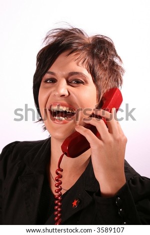 Sexy receptionist on telephone smiling and looking at the camera isolated on white