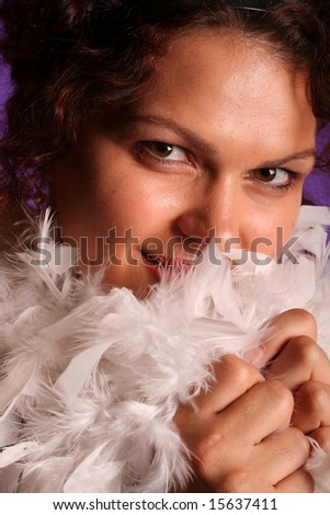 Happy woman with feather boa