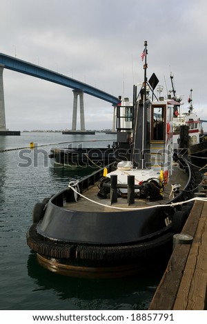 Tug Boat tied up at a dock