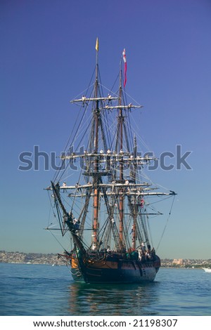 Tall Sailing Ship with shoreline in the background