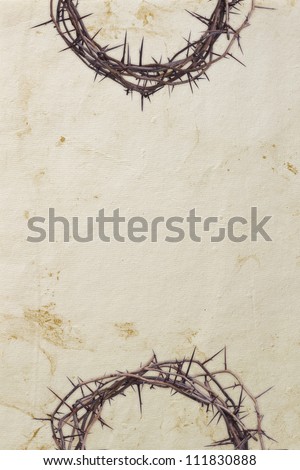 Crown of thorns on textured background
