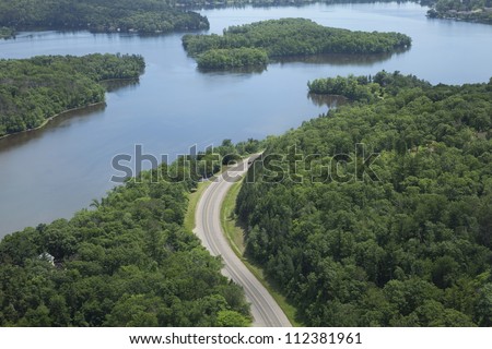 Aerial view of the Mississippi River and a curving road near Brainerd, Minnesota