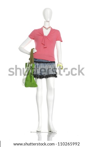 full-length collection of dress with bag on mannequin