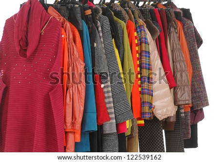 Set of female clothes Variety of hanging on clothes rack