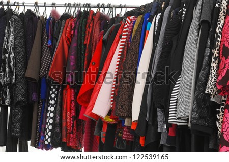 female clothes Variety of hanging on clothes rack