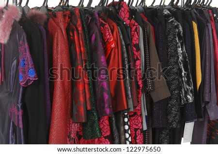 female clothes hanging on clothes rack