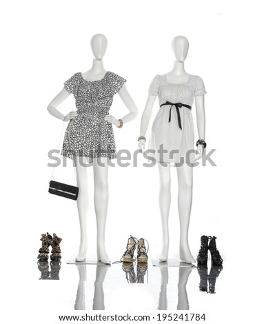 female dress and shoe with bag on full-length two mannequin