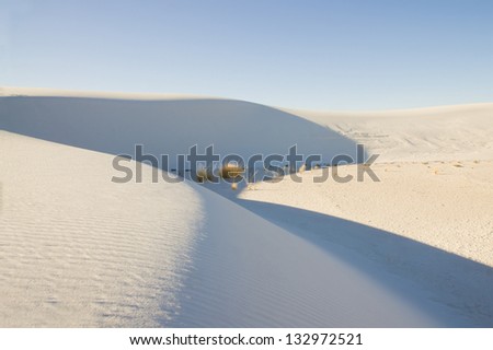 Parabolic dune of white gypsum sand. White Sands National Monument, New Mexico
