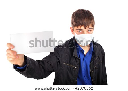 teenager in the flu mask with blank paper