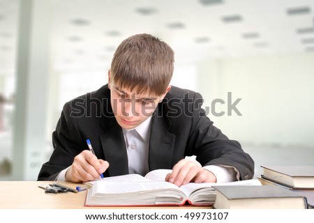 teenager studying hard for the exam