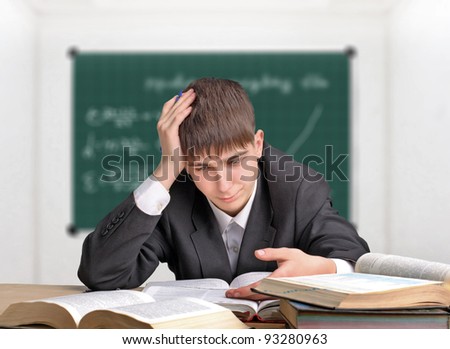 teenager studying hard for the exam