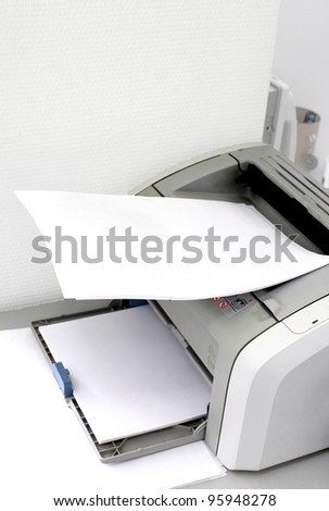blank paper on the printer in the office
