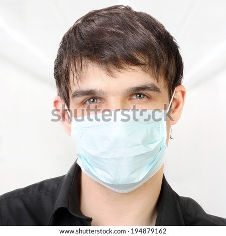 Serious Man in the Flu Mask