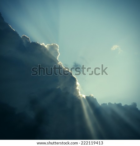 Toned photo of Dramatic Cloudscape Area with Ray of Light