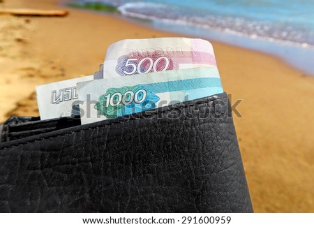 Wallet with Russian Rubles on the Seaside Background