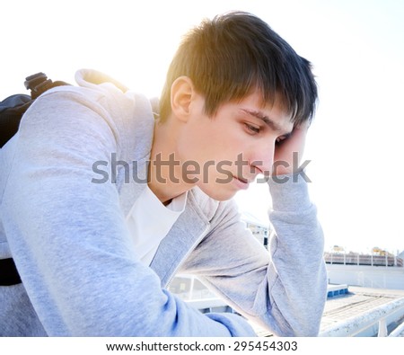 Sad Young Man Portrait at the Summer Day