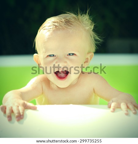 Toned Photo of Happy Child Portrait at Sunny Summer Day