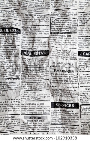 Fake Classified Ad, Crumpled; Newspaper, business concept.