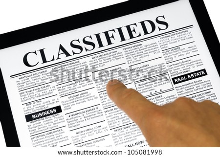 Fake Classified Ad, newspaper and Touch Screen, business concept.