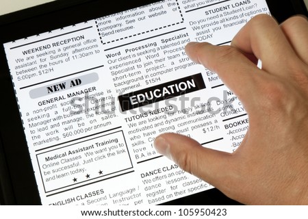 Fake Classified Ad, newspaper and Touch Screen, Education concept.