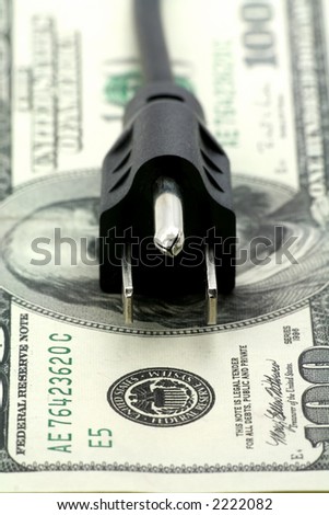 power cord and us dollar, concept of expensive energy bill