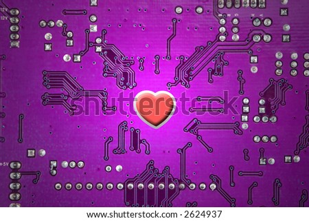 red heart and circuit board, online love concept, close up