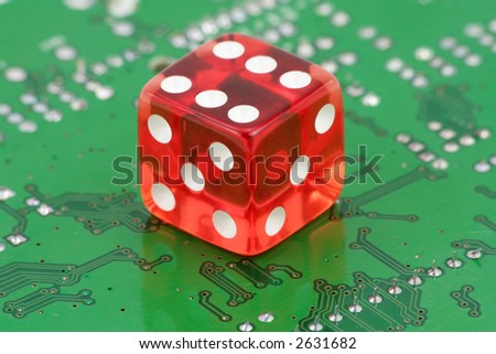 red dices and circuit board, concept of online gambling