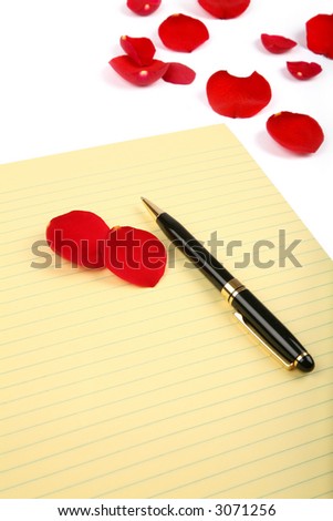 red rose petals and letter paper in white background, love concept