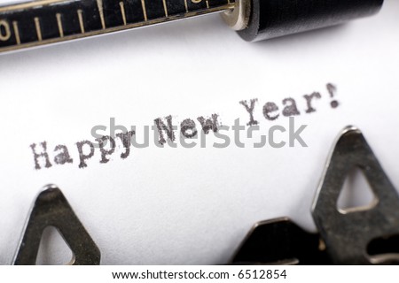 Typewriter close up shot, concept of Happy New Year