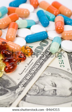 Medicine pills and dollar, concept of high cost medicine bill