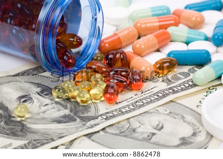 Medicine pills and dollar, concept of high cost medicine bill