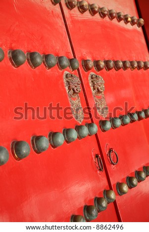 Ancient red Temple door in forbidden city beijing china
