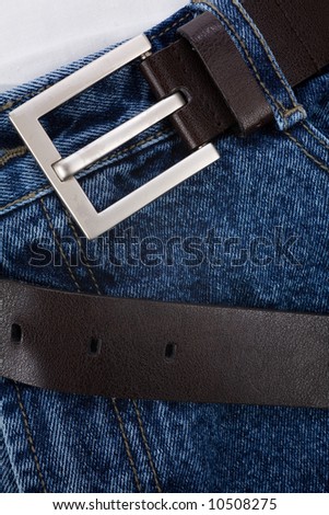 a blue jean and belt close up shot